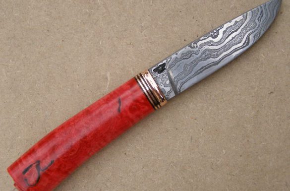 Curly pink ivory knife handle