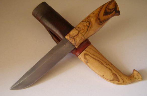 Wild olive knife handle and she