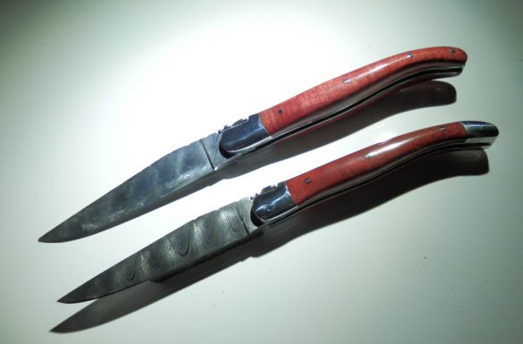 Curly pink ivory knife handle