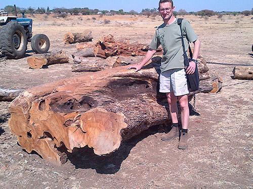 Etienne of ProSono Hardwoods, with a very large, prime log of African olive hardwood