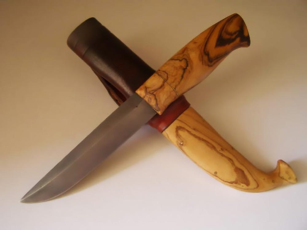 Knife handles made from African or wild olive wood.