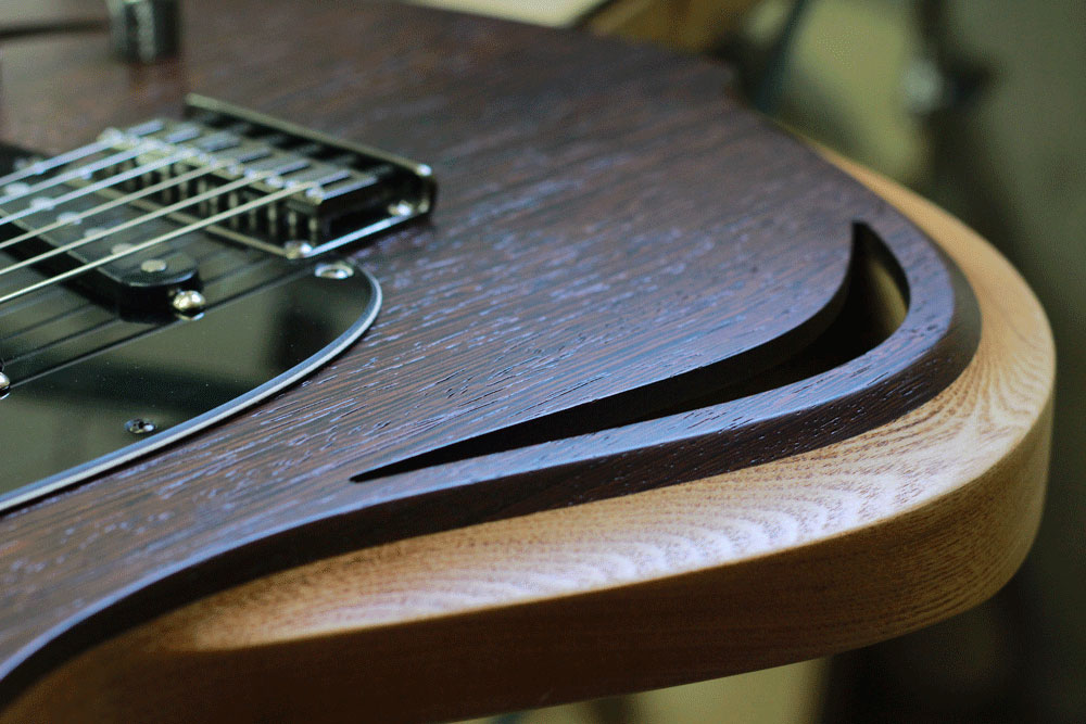 A unique guitar with a wenge top and ash body, by Polak Custom Guitars.