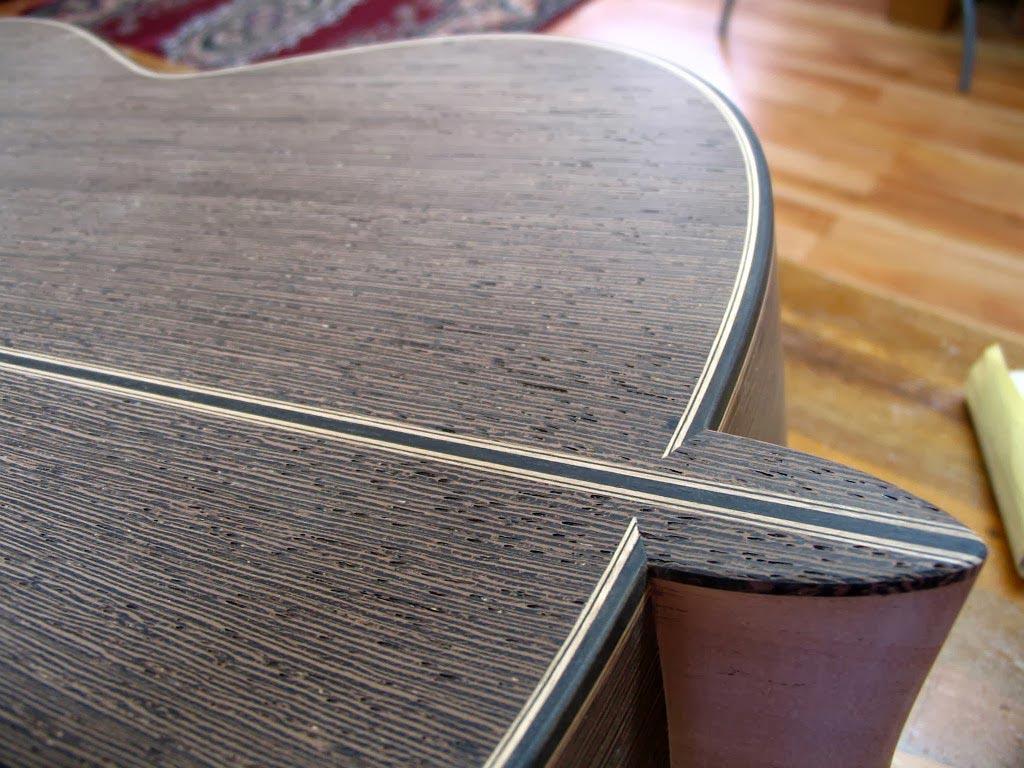 A guitar built by Douglas Scott of Scott Classical Guitars, with very pronounced, tight grain patterns. 