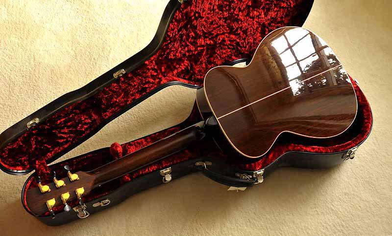 A wenge guitar with a high-shine finish, made by Stefan Sobell Guitars.