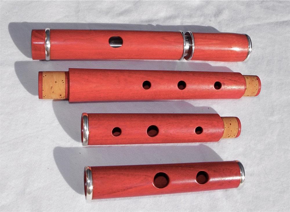 A Pink Ivory F flute with silver rings